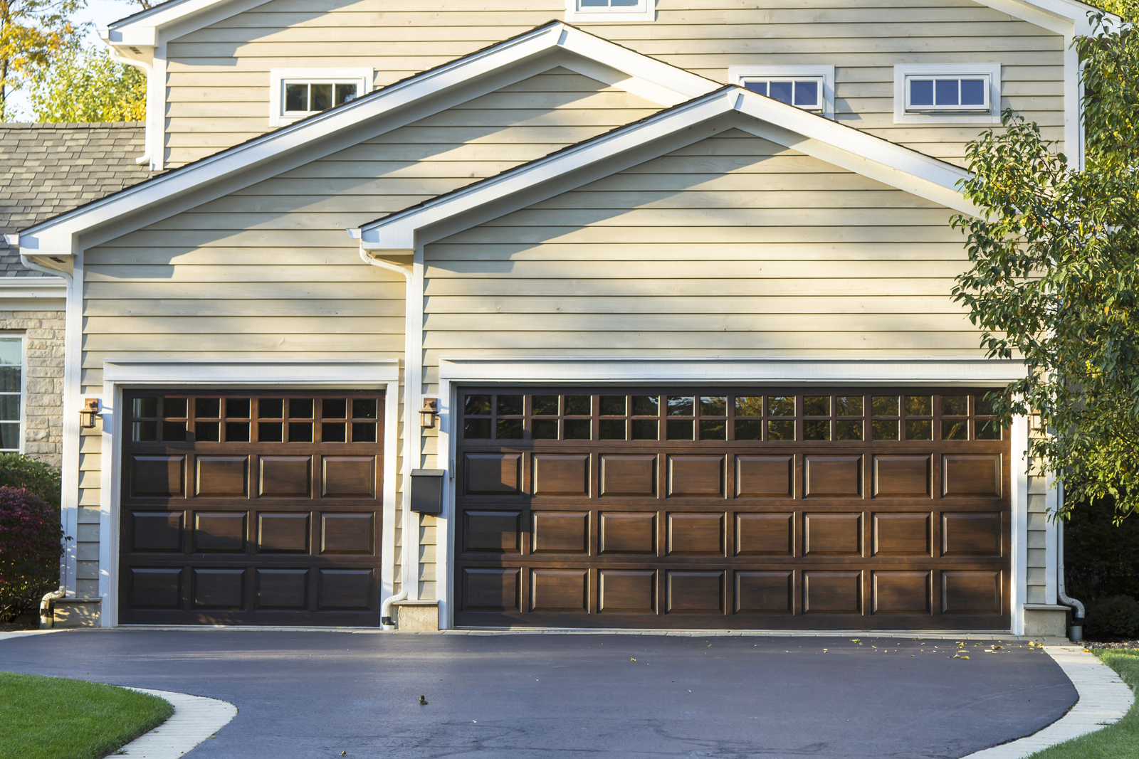 Enhancing your home's curb appeal can be significantly achieved by selecting a garage door that complements your property's architectural style. For instance, a modern home might benefit from a sleek, minimalist garage door design, while a traditional home could be accentuated with a classic carriage-style door. Incorporating elements like windows, decorative hardware, or distinctive paneling can further elevate the aesthetic appeal. Regular maintenance, such as cleaning and repainting, ensures the garage door remains an attractive focal point, thereby boosting the overall curb appeal of your home.